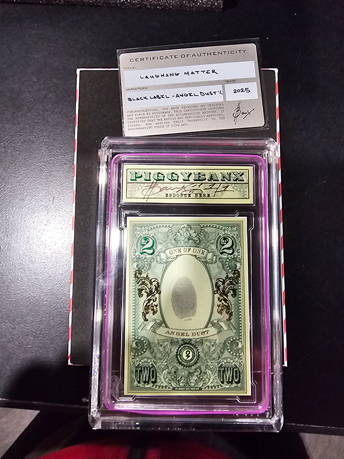 PIGGYBANX 2025 "LAUGHING MATTER" 10/14/25 BLACK LABEL ANGEL DUST VARIATION
