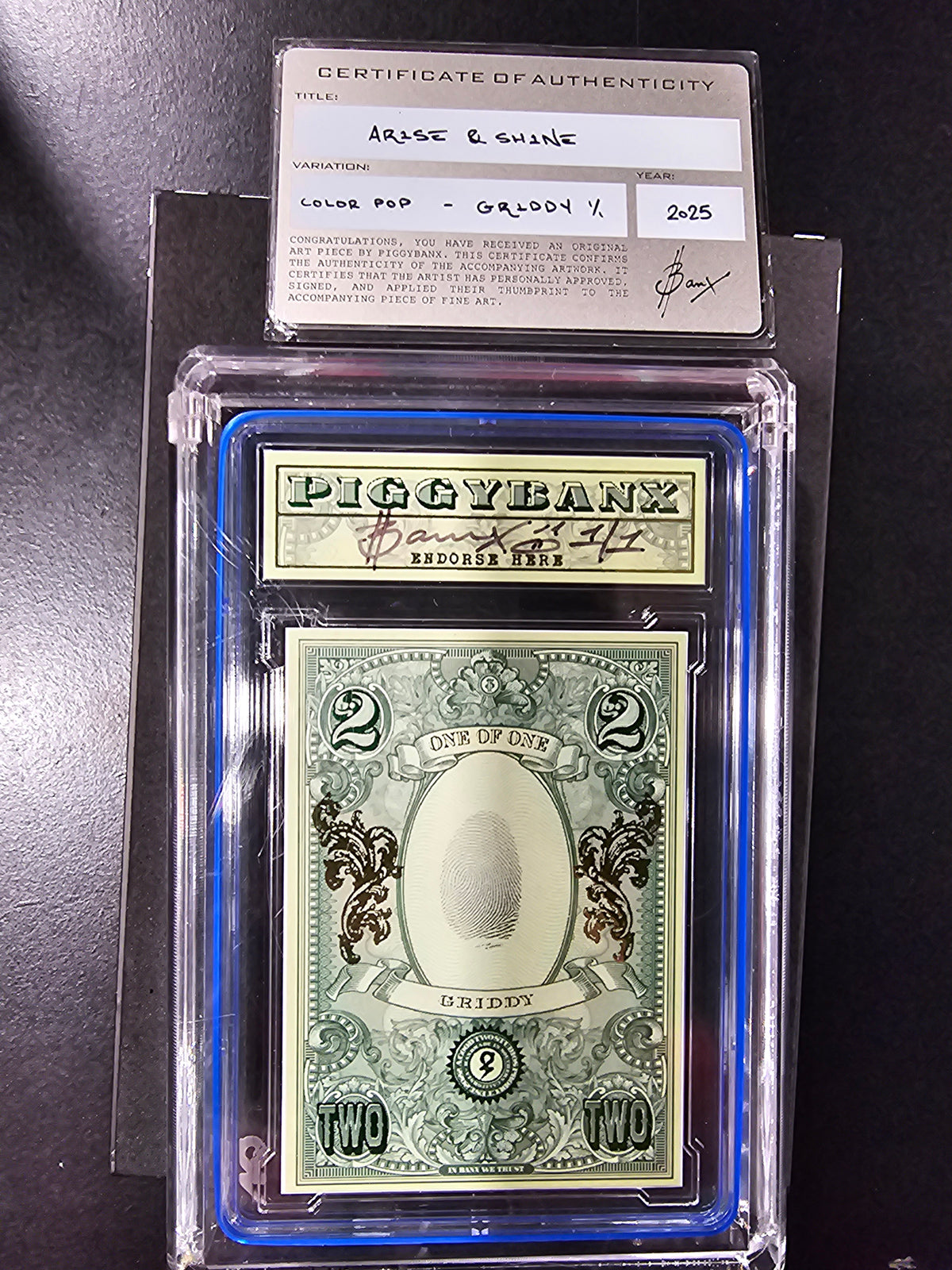 PIGGYBANX 2025 ARISE & SHINE 04/23/25 GRIDDY VARIATION