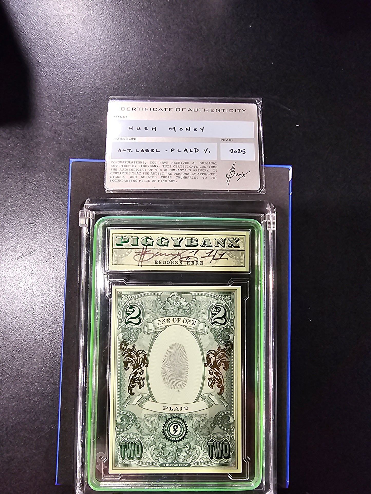PIGGYBANX 2025 GREEN LABEL "HUSH MONEY" 07/24/25 PLAID VARIATION